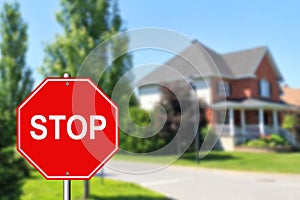 Stop sign at an intersection with a street