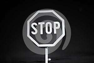 Stop sign, night scene, colorless