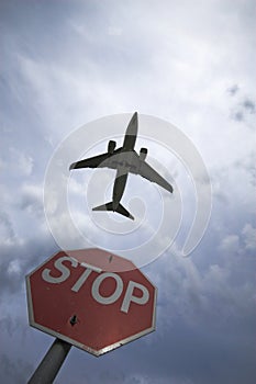 Stop sign and plane