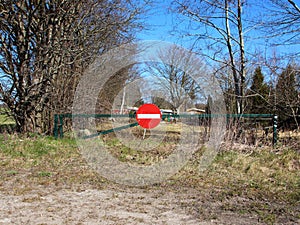 Stop Sign without Road at Field Entrance