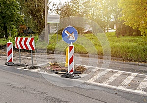 Stop sign on the road. Road closed sign. Construction, renovation of the road in the city.