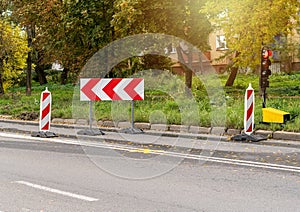 Stop sign on the road. Road closed sign. Construction, renovation of the road in the city.