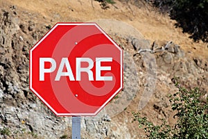 Stop sign of the route in Spanish language