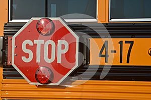 Stop Sign on the side of a school bus