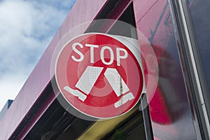 Stop sign on a tram