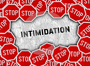 Stop sign and word intimidation photo