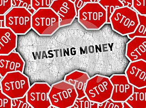 Stop sign and word wasting money