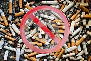 Stop smoking and many dirty cigarettes butts