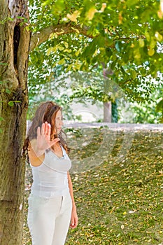 Stop and talk to my hand gesture by over 40 woman