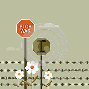 `Stop War` signages on both sides of a fenced international border