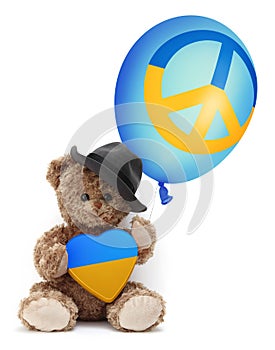 Stop war in Ukraine and humanitarian aid to refugees. Teddy bear showing a heart in the colors of the Ukrainian flag. He is