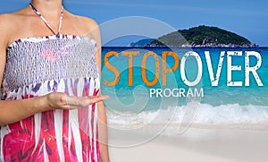 Stopover program concept is presented by woman on the beach photo