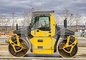 Stopped drum roller at the construction site.