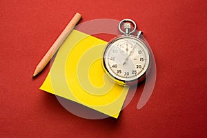 Stopwatch, pencil and label