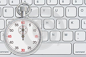 Stopwatch 60 seconds on gray keyboard photo