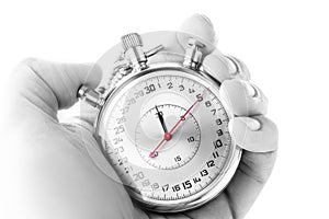 Stopwatch timekeeper and hand of a man photo