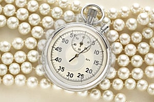 Stopwatch on white pearl