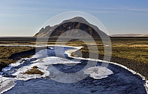 Stora- Dimon across the flat Volcanic Silt and Ash delt of Markarfljot, Iceland photo