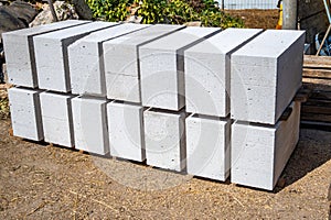 Storage of aerated concrete blocks close-up. Laying aerated concrete blocks.