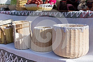 Storage baskets. Baskets wicker from corn leaves. Folk art of the Balkans