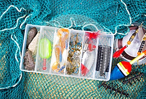 Storage box with accessories for fishing.