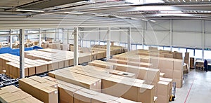 Storage of cardboard boxes in a large warehouse of an industrial