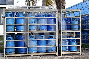 Storage of gas bottles at the back of a gas station. Primary source of energy in households.