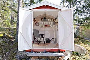 Storage shed filled with garden tools