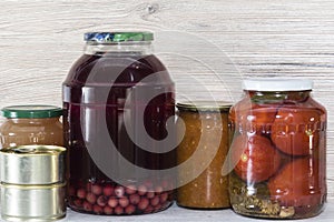 Storage shelves in pantry with homemade canned preserved fruits and vegetables