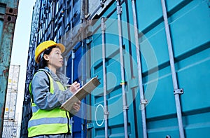 Storage shipping container, cargo worker and logistic woman employee with data. Construction and stock logistics asian