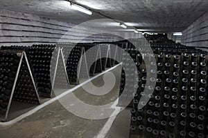 The storage of sparkling wine in a wine cellar.