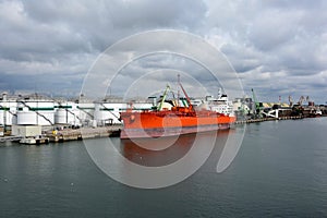 Storage tanks and tanker in the harbour