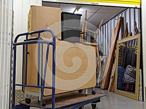 Self storage unit clearance moving in furniture photo