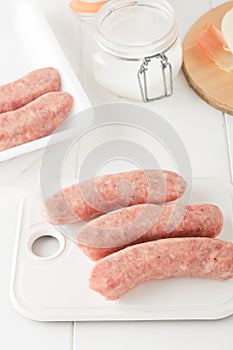 Store bought uncooked meat sausages