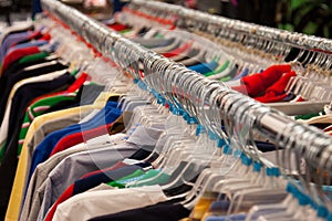 Store Cloths Hangers on Rail photo