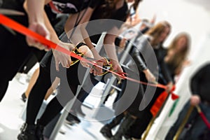 Store grand opening - cutting red ribbon photo