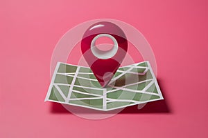 Store with map pin on pink background, online shopping concept