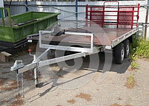 A store that sells trailers.Car open trailer. Transport for cargo transportation