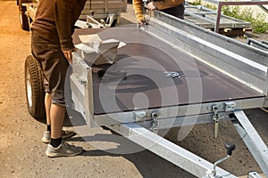 A store that sells trailers.Car open trailer. Transport for cargo transportation