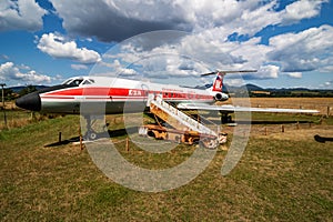 Stored classic airliner. Old timer passenger plane at museum. Aviation and aircraft. Aerospace industry.