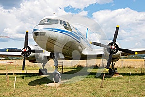 Stored classic transport plane. Old timer freighter plane at museum. Aviation and aircraft. Aerospace industry.