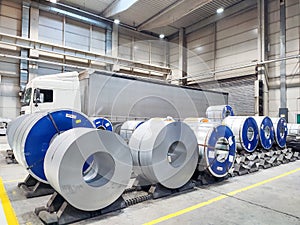 Stored coils of steel sheets in an automotive factory