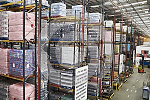 Stored goods in large distribution warehouse, elevated view