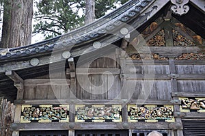 Storehouse facade with famous Monkeys carving from Toshogu Shrine Temple in Nikko National Park of Japan