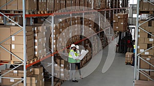 Storehouse with racks full of goods in boxes