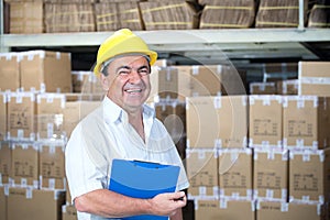 Storekeeper at work in warehouse photo