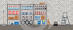 Storeroom. Shelving with household goods. Warehouse racks on a brick wall bacground