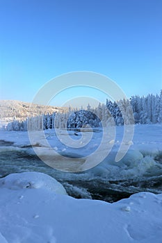 Storforsen in a fabulous winter landscape photo