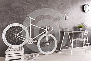 Storing white bike photo