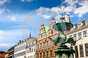 The Stork Fountain on Amagertorv Amager Square in the center of Copenhagen. Denmark. Summer sunny day photo